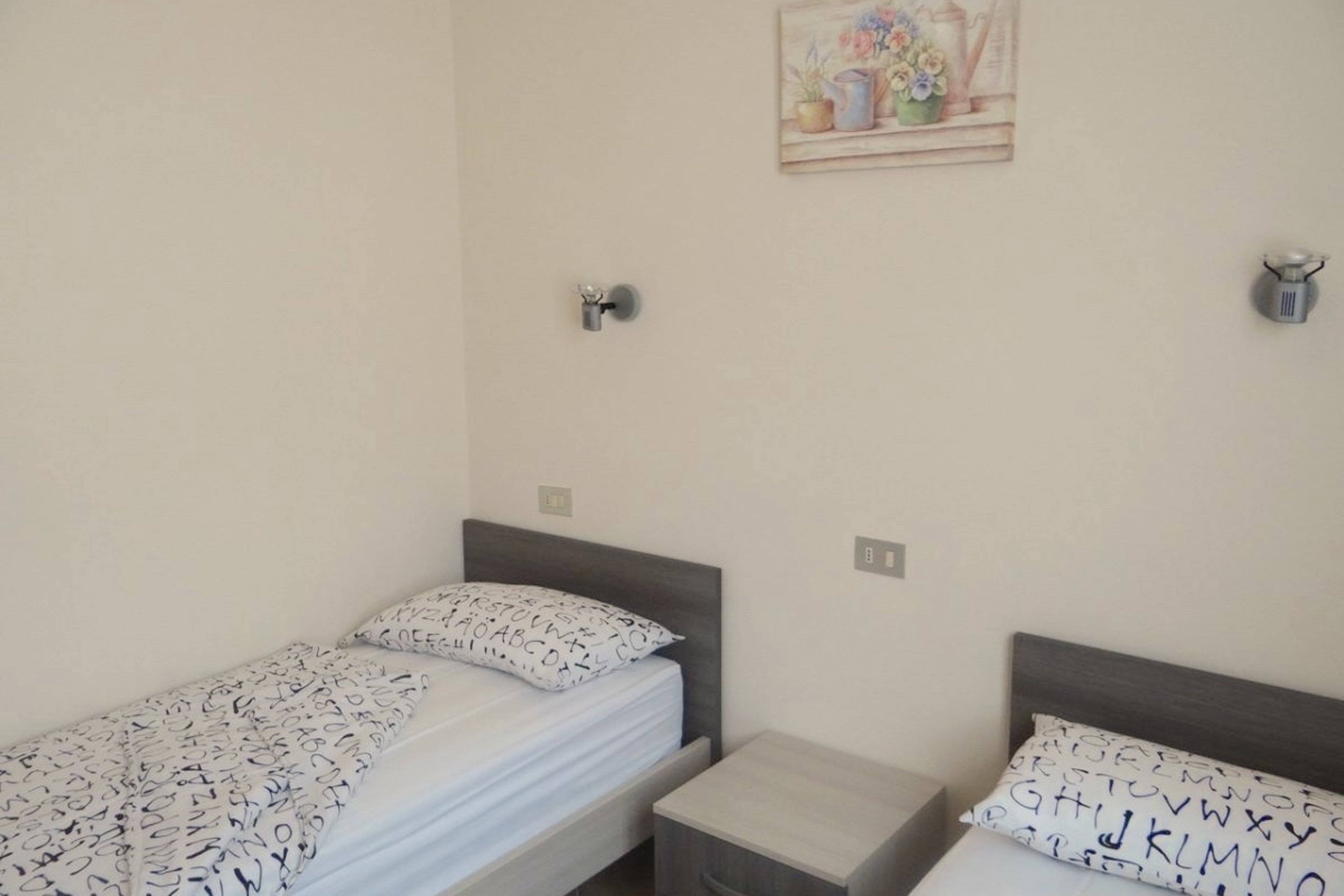 Schlafzimmer 2 mit zwei Einzelbetten