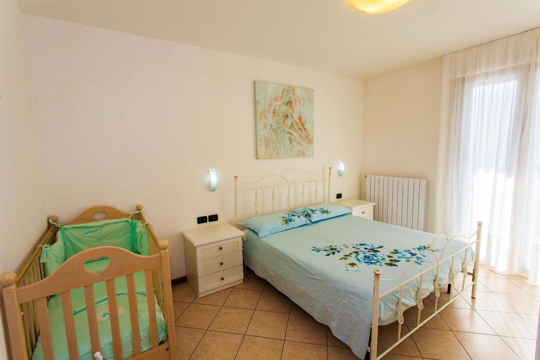 Schlafzimmer 1 mit Babybett