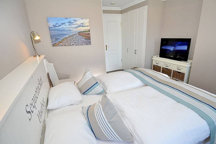 Flachbildschirm im Schlafzimmer