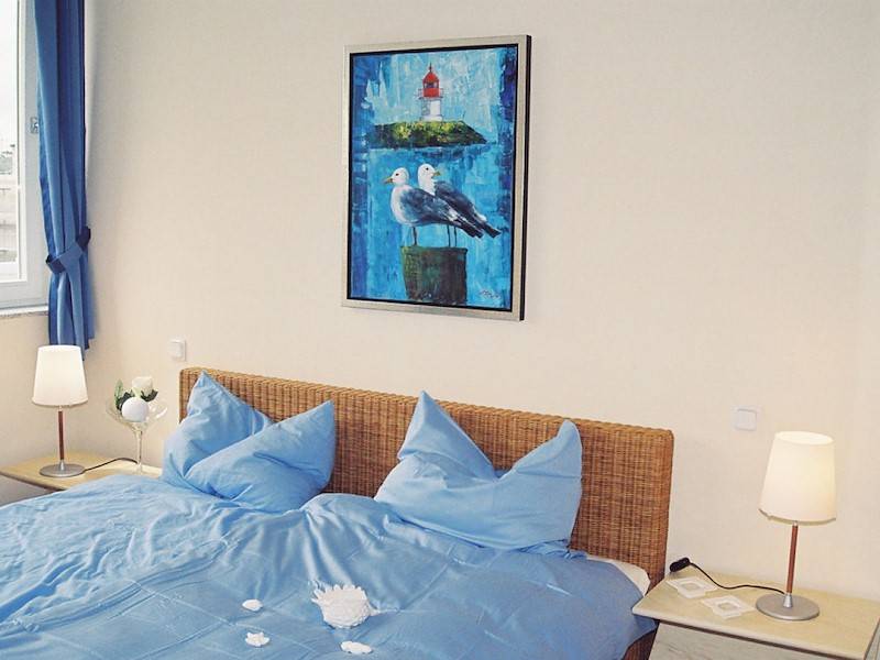 Das zweite Schlafzimmer mit Flatscreen und Bad en suite.