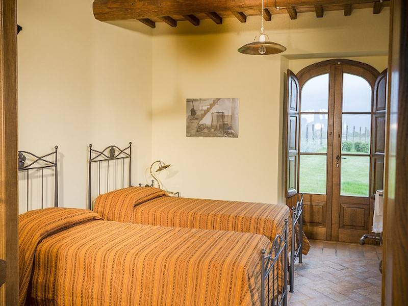 Das Schlafzimmer im Erdgeschoss der Villa Sorano.